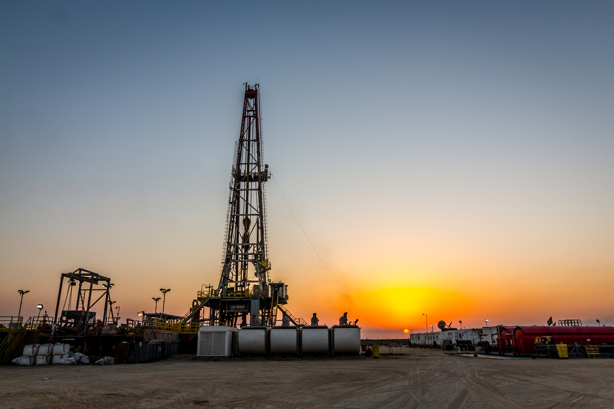 fracking oil rig at sunset